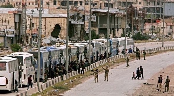خروج المسلحين من حرستا السورية (أرشيف)