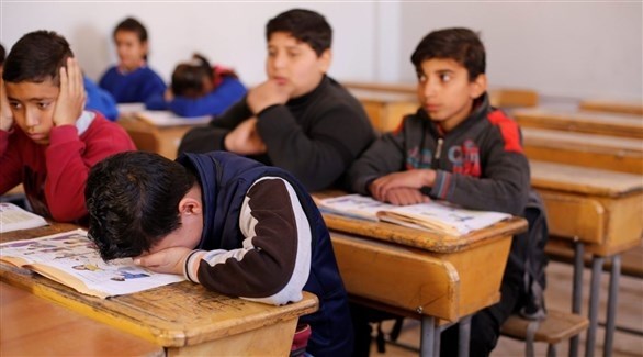 تلامذة سوريون في مدرسة قرب دمشق.(رويترز)