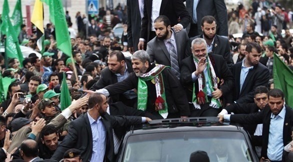 زعيم حماس السابق خالد مشعل والحالي اسماعيل هنية في تجمع بغزة (أرشيف)