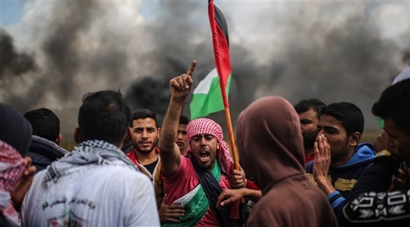 جانب من تظاهرة بالقرب من السياج الفاصل في غزة (أرشيف)