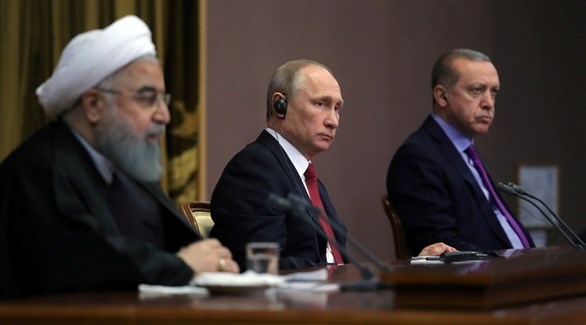 الرؤساء التركي رجب طيب أردوغان والروسي فلاديمير بوتين والإيراني حسن روحاني.(أرشيف)