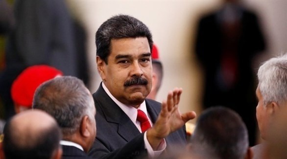 الرئيس مادورو بعد رحيله من  المجلس الوطني الانتخابي في كاراكاس (رويترز)