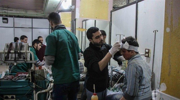 طاقم لأطباء بلا حدود يعالجون أشخاصاً مصابين في دمشق (أرشيف)