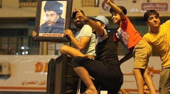 عراقيون يحتفلون بفوز تحالف"سائرون" بزعامة مقتدى الصدر في الانتخابات (أرشيف)