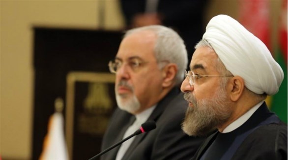 الرئيس الإيراني حسن روحاني ووزير الخارجية محمد جواد ظريف.(أرشيف)