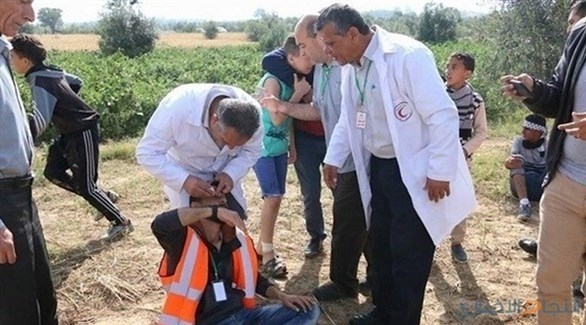 أحد المسعفين المصابين برصاص الاحتلال الإسرائيلي (أرشيف)