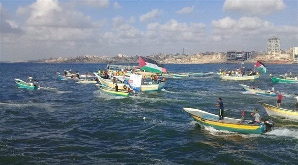 مسيرة بحرية في بحر غزة احتجاجاً على الحصار الإسرائيلي (تويتر)