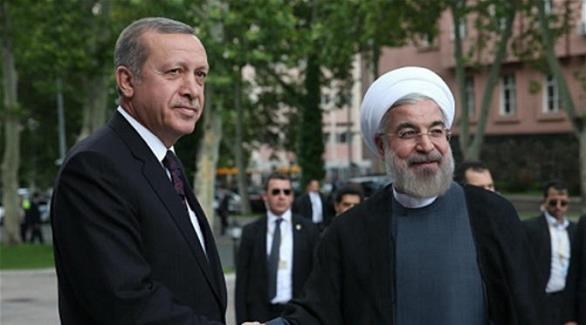الرئيس التركي رجب طيب أردوغان ونظيره الإيراني حسن روحاني (أرشيف)