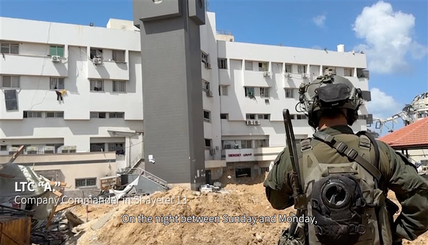 الجيش الإسرائيلي بالقرب من مستشفى الشفاء بغزة (رويترز)