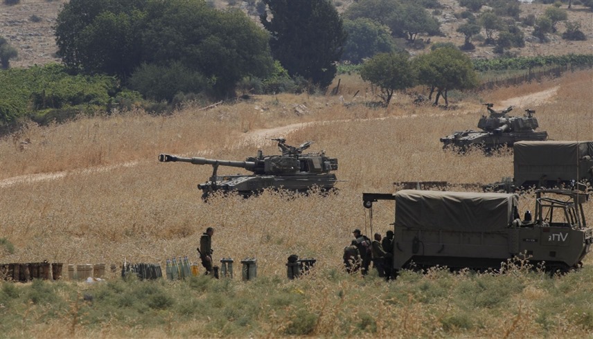 قوات إسرائيلية على الحدود مع لبنان (رويترز)