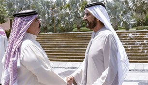 محمد بن راشد يلتقي ملك البحرين 