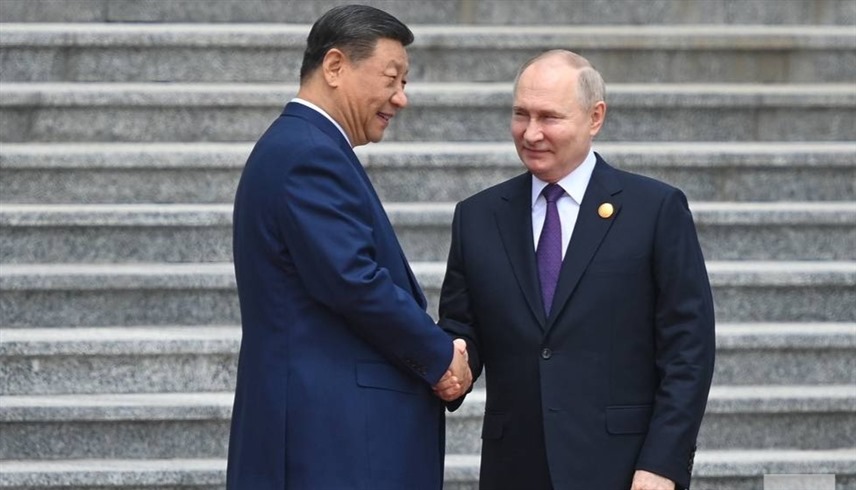 الرئيس الروسي فلاديمير بوتين ونظيره الصيني شي جين بينغ (تاس)