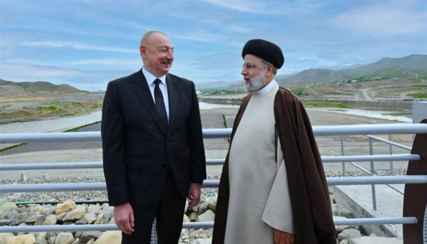 الرئيسان الإيراني الراحل ابراهيم رئيسي والأذري إلهام علييف (أرشيف)