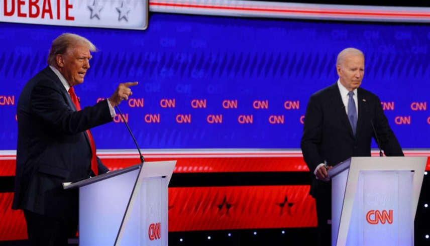 الرئيسان الأمريكيان الحالي جو بايدن والسابق دونالد ترامب في المناظرة التلفزيونية (رويترز)