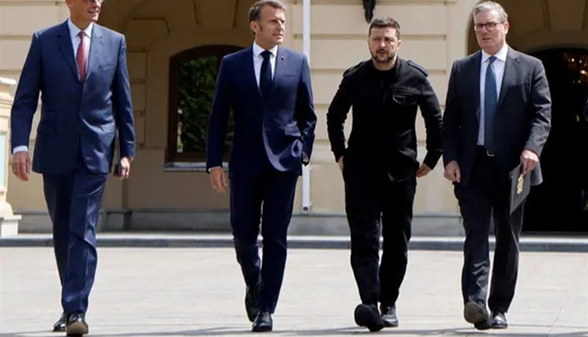 الرئيس الأوكراني فولوديمير زيلينسكي والرئيس الفرنسي إيمانويل ماكرون ورئيس وزراء بريطانيا ومستشار ألمانيا (أرشيف)