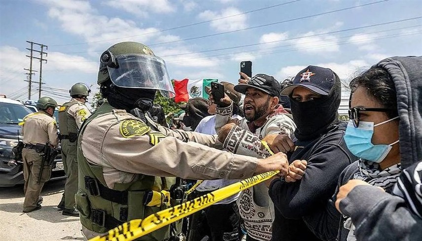 متظاهرون ومهاجرون في لوس أنجليس يواجهون جنود الحرس الوطني الأمريكي (إكس)