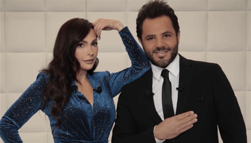الإعلامي نيشان وأمل حجازي 