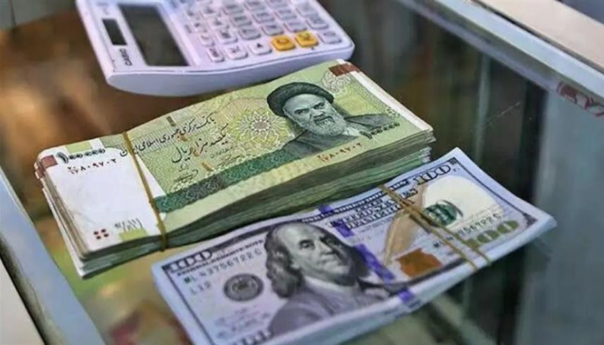 الريال الإيراني والدولار الأمريكي (أرشيف)