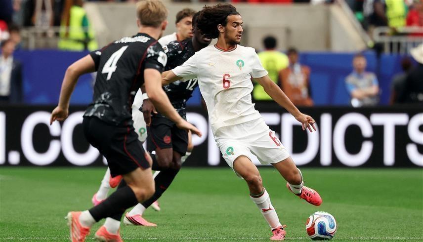 نجم منتخب المغرب أيوب بو عدي أمام كندا (رويترز)