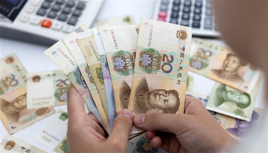 أوراق نقدية من اليوان الصيني (رويترز)