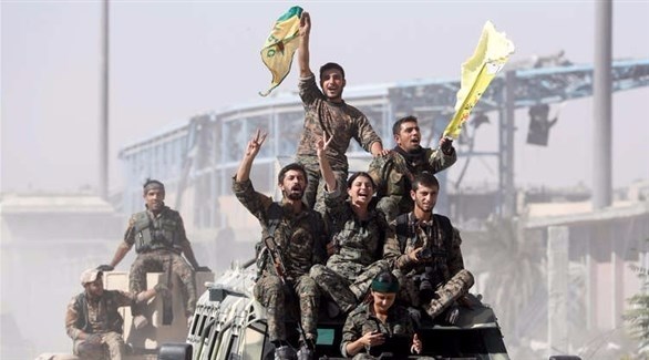 مقاتلون من قوات سوريا الديمقراطية "قسد" في الرقة.(أرشيف)