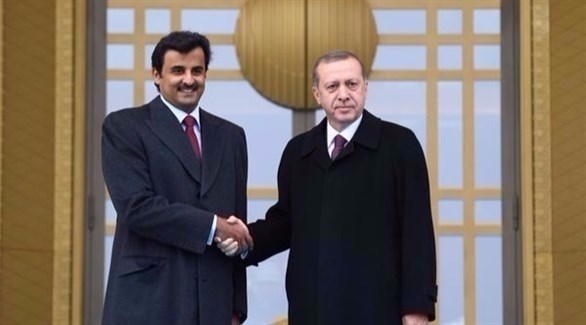الرئيس التركي رجب طيب أردوغان وأمير قطر الشيخ تميم بن حمد.(أرشيف)