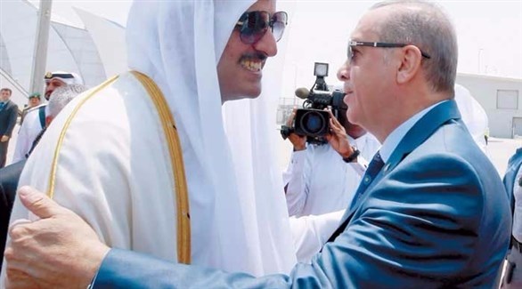 الرئيس التركي رجب طيب أردوغان وأمير قطر الشيخ تميم.(أرشيف)