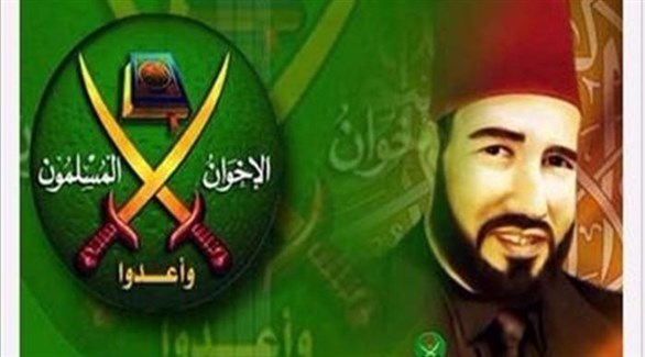شعار الغخوان المسلمين مع صورة مؤسس التنظيم حسن البنا.(أرشيف)