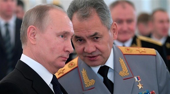 الرئيس الروسي فلاديمير بوتين ووزير الدفاع سيرغي شويغو.(أرشيف)
