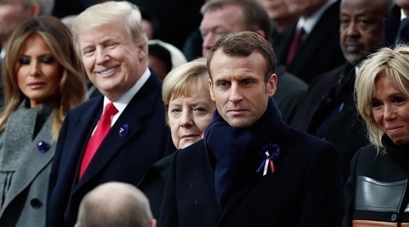 الرئيسان الفرنسي إيمانويل ماكرون والأمريكي دونالد ترامب والمستشارة الالمانية أنغيلا ميركل في احتفالات مئوية الهدنة.(أف ب)