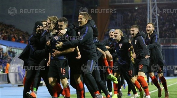 فرحة لاعبي كرواتيا بالفوز (رويترز)