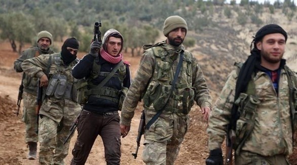 مقاتلون في فصائل سورية موالية لأنقرة في عفرين (أرشيف)