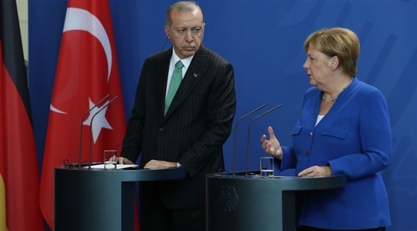 المستشارة الألمانية أنغيلا ميركل والرئيس التركي رجب طيب اردوغان.(أرشيف)