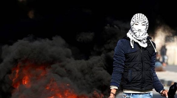 مقنع فلسطيني أثناء الاشتباكات 