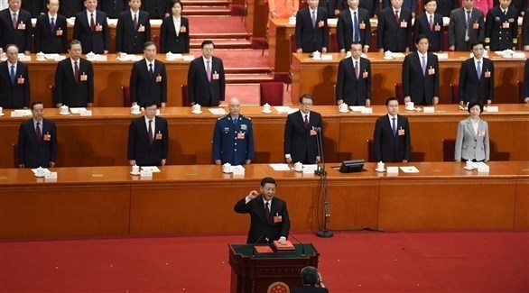 الرئيس الصيني يقسم اليمين بعد انتخابه لولاية جديدة (أ ف ب)