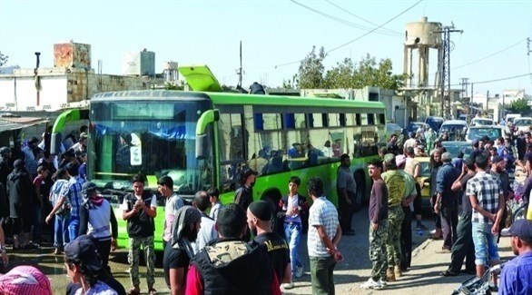 حافلات سورية لنقل مدنيين من مناطق النزاع (أرشيف)