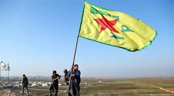 مقاتلون أكراد يرفعون علمهم في شمال سوريا.(أرشيف)