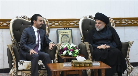 الزعيم الشيعي مقتدى الصدر ورئيس البرلمان العراقي محمد الحلبوسي (أرشيف)