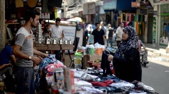 فلسطينية في أحد أسواق غزة (أرشيف)