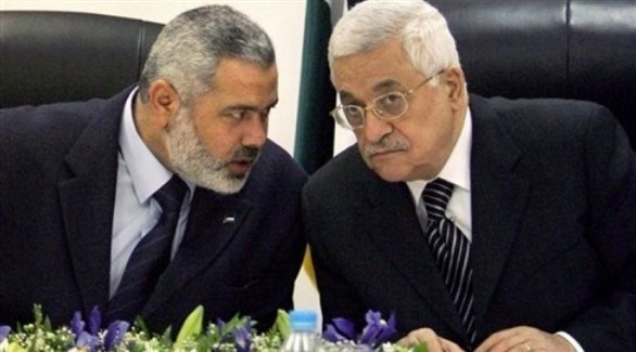 الرئيس الفلسطيني محمود عباس ورئيس المكتب السياسي لحماس اسماعيل هنية (أرشيف)