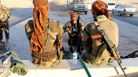 مقاتلون أكراد في سوريا.(رويترز)