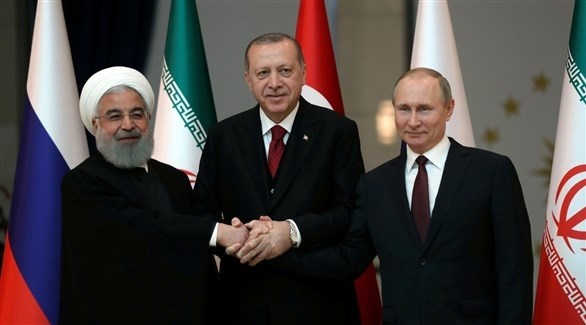 الرؤساء الروسي فلاديمير بوتين والتركي رجب طيب أردوغان والإيراني حسن روحاني (أرشيف)