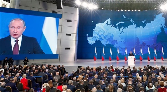 بوتين متحدثاً أمام البرلمان الروسي (اي بي ايه)