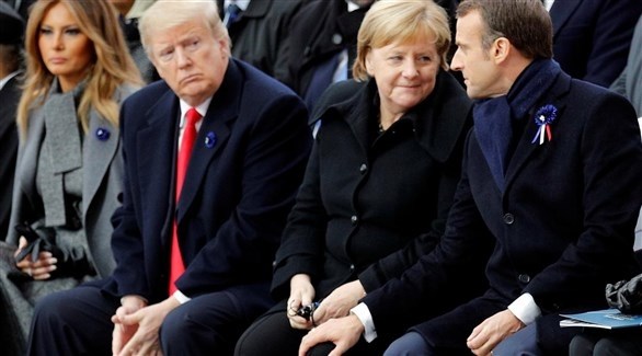 الرئيس الفرنسي إيمانويل ماكرون والمستشارة الألمانية أنجيلا ميركل والرئيس الأمريكي دونالد ترامب وزوجته (أرشيف)
