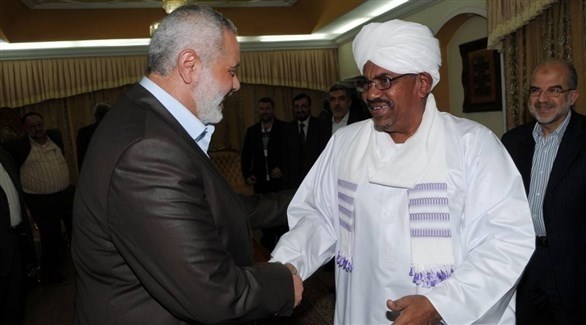 الرئيس السوداني المخلوع عمر البشير وزعيم حماس إسماعيل هنية (أرشيف)