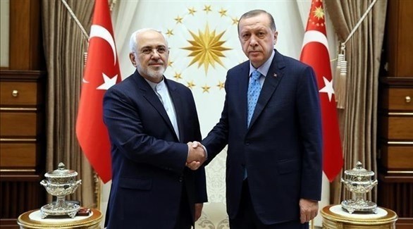 الرئيس التركي رجب طيب أردوغان ووزير الخارجية الإيراني محمد جواد ظريف.(أرشيف)