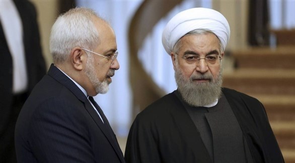 الرئيس الإيراني حسن روحاني ووزير خارجيته جواد ظريف (أ ب)