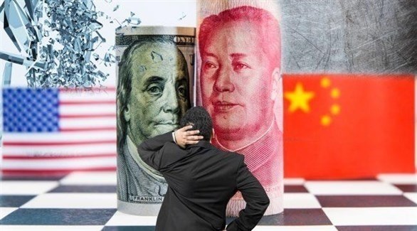 اليوان الصيني والدولار الأمريكي (تعبيرية)