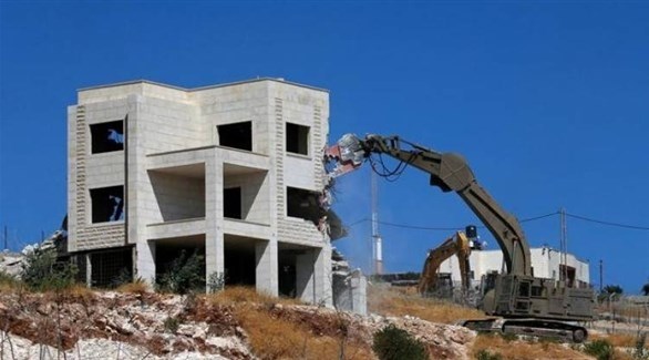 جرافات الاحتلال الإسرائيلي تهدم مبنى فلسطينياً جنوب القدس (أرشيف)