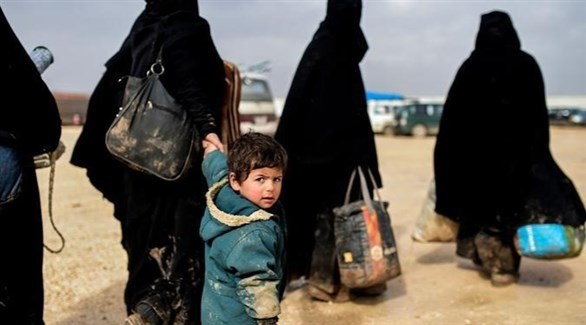 طفل ونساء من داعش في مخيم الهول السوري (أرشيف)